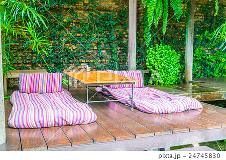 Relaxation space in garden with beds . 24745830