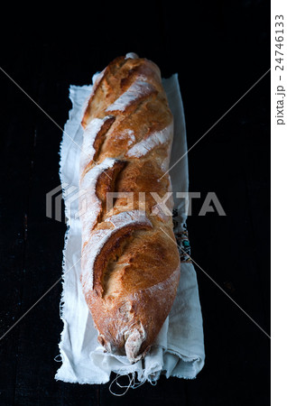 Baguette on black background. Baguette on black background. 24746133