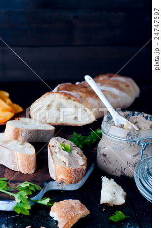 mousse, pate in a jar with  baguette and parsley 24747597