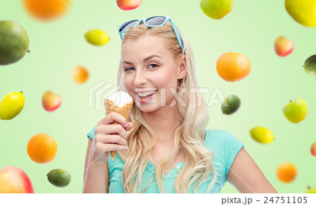 happy young woman in sunglasses eating ice cream happy young woman in sunglasses eating ice cream 24751105