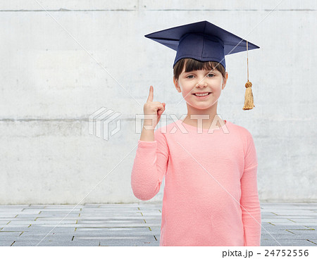 happy girl in bachelor hat or mortarboard happy girl in bachelor hat or mortarboard 24752556