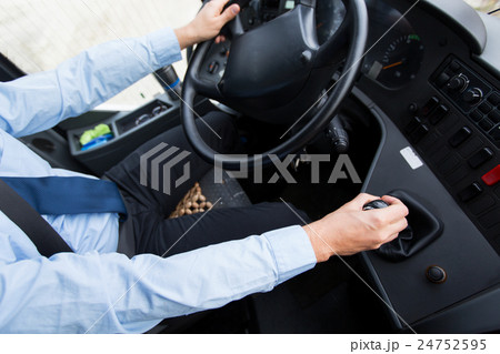 close up of driver driving passenger bus close up of driver driving passenger bus 24752595