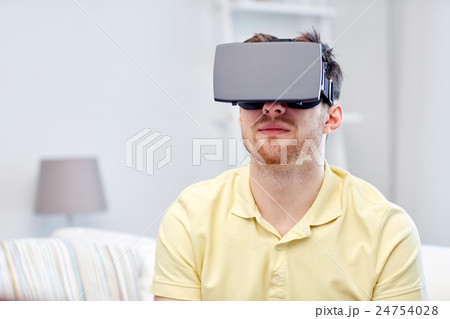 young man in virtual reality headset or 3d glasses young man in virtual reality headset or 3d glasses 24754028