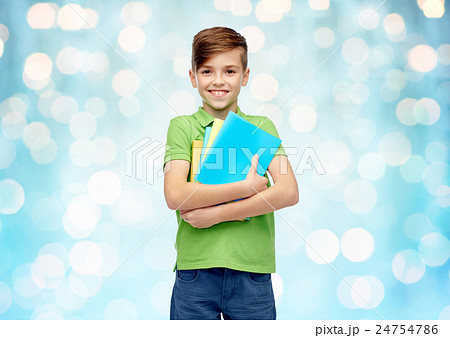 happy student boy with folders and notebooks happy student boy with folders and notebooks 24754786