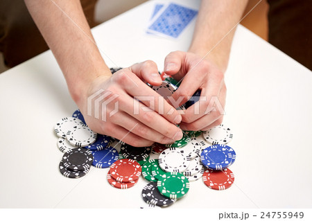 hands with casino chips making bet or taking win 24755949