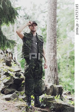 young soldier or ranger in forest 24757185