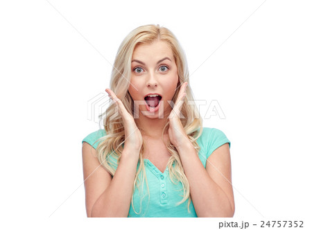 surprised smiling young woman or teenage girl surprised smiling young woman or teenage girl 24757352
