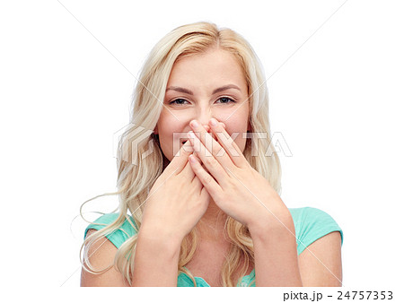 young woman or teenage girl closing her nose young woman or teenage girl closing her nose 24757353