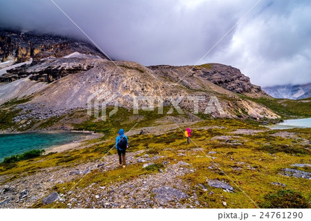 traveler with snow mountain and lake traveler with snow mountain and lake 24761290