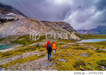 traveler with snow mountain and lake traveler with snow mountain and lake 24761291