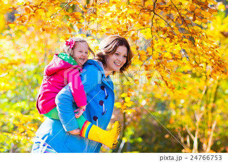 Mother and child in autumn park Mother and child in autumn park 24766753