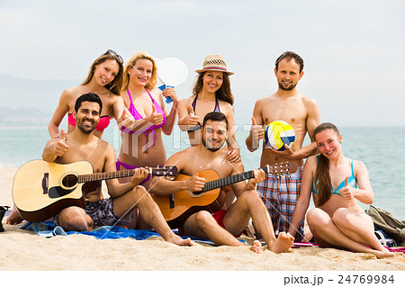 Friends play guitar Friends play guitar 24769984