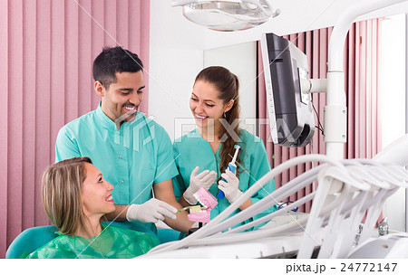 Dentist at surgery office Dentist at surgery office 24772147
