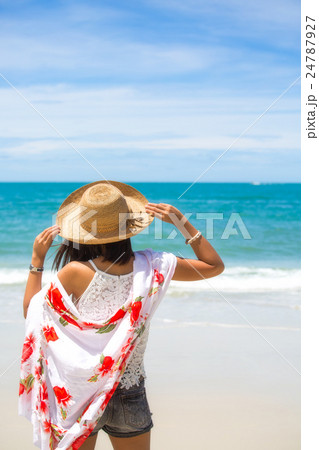 Travel asia woman with hat and dress on sea 24787927