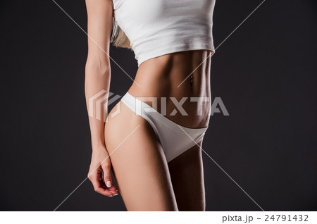 close up picture of woman trained abs close up picture of woman trained abs 24791432