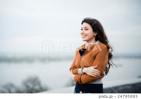 Young beautiful girl woman enjoying riverview in Young beautiful girl woman enjoying riverview in 24795893