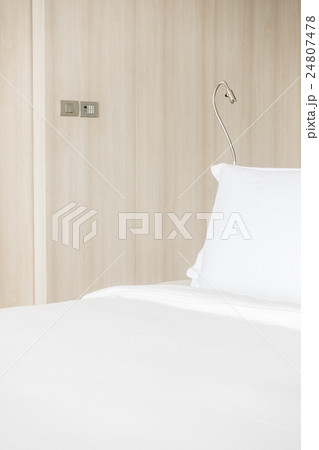 White pillow on bed 24807478