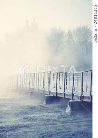 Old bridge over the icy river Old bridge over the icy river 24815255