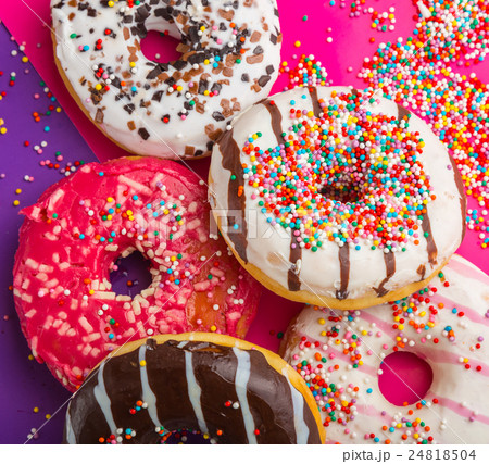 Donuts on color background. 24818504