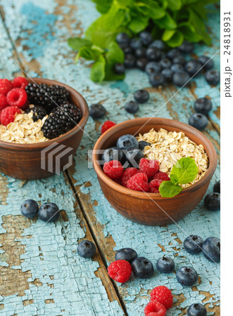 Healthy Homemade Oatmeal with Berries for Breakfast 24818931