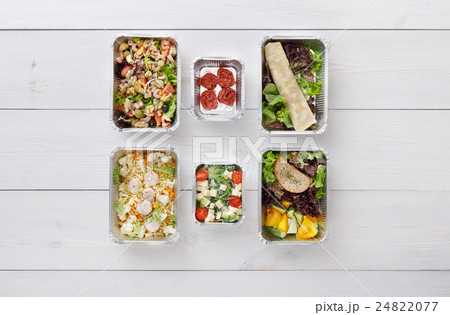 Healthy food take away in boxes, top view at wood 24822077
