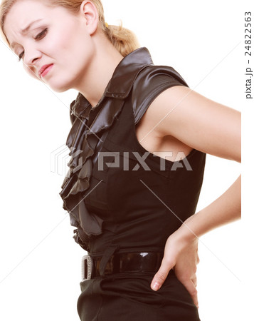 Backache. Young woman suffering from back pain Backache. Young woman suffering from back pain 24822563