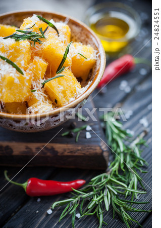Crunchy croutons in bowl with rosemary 24824551