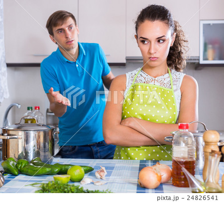Couple quarreling at kitchen 24826541