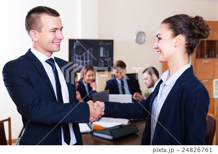 Business people handshaking Business people handshaking 24826761