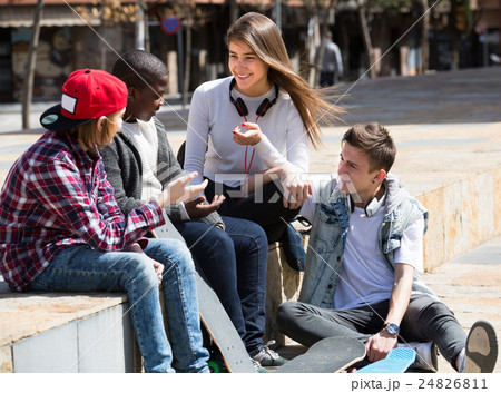 teens spending time together in sunny day 24826811