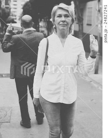 irritated woman outdoors 24827241