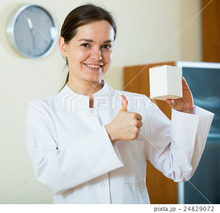 Female therapeutist recommending new dietary supplement Female therapeutist recommending new dietary supplement 24829072