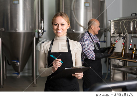 Female worker on beer brewery. 24829276