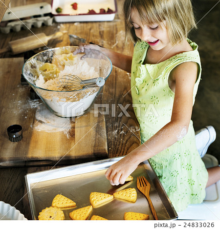 Little Girl Baking Cookies Concept Little Girl Baking Cookies Concept 24833026