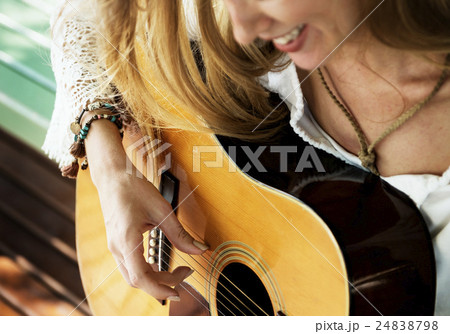 Guitar Girl Relaxation Casual Instrument Leisure Concept Guitar Girl Relaxation Casual Instrument Leisure Concept 24838798