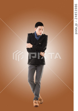 Asian young man feel cold 24853986