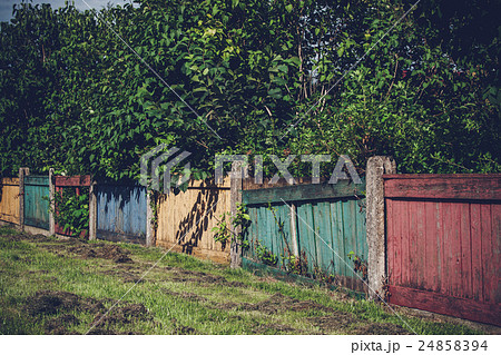 Wooden fence in various colors 24858394