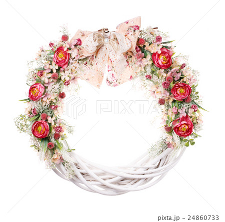 decorative wreath on the door with flowers decorative wreath on the door with flowers 24860733