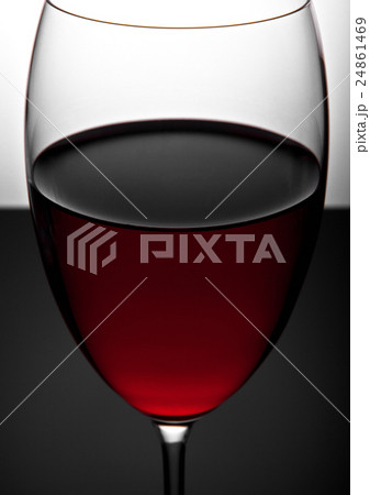 Glass of red wine close up photography 24861469