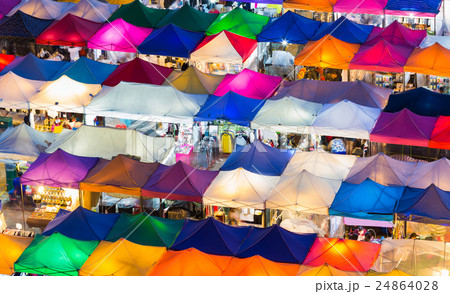 Close up multiple colours nights market rooftop 24864028