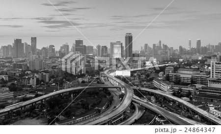 Intersection highway with city downtown 24864347