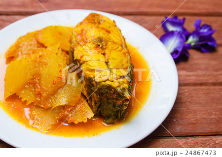 Hot and sour with fish and papaya. Hot and sour with fish and papaya. 24867473