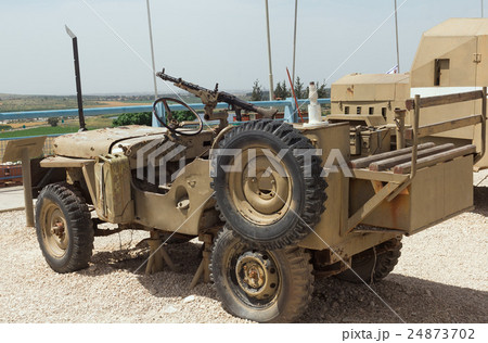 old army vehicle with a machine gun old army vehicle with a machine gun 24873702