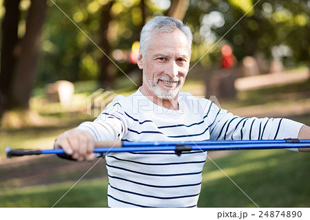 Handsome old man doing sports outdoors 24874890