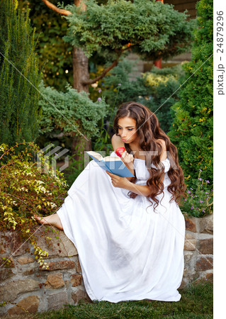 Girl with enthusiasm reads book Girl with enthusiasm reads book 24879296