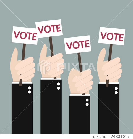 Businessmen holding a signboard with the word vote Businessmen holding a signboard with the word vote 24881017