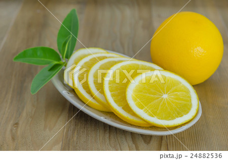 slice orange on dish 24882536