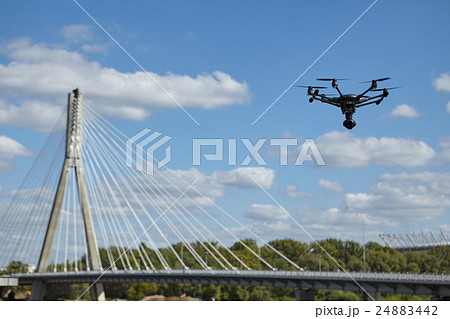 Copter flight against blue sky. RC aerial drone. Copter flight against blue sky. RC aerial drone. 24883442