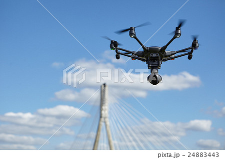 Copter flight against blue sky. RC aerial drone. Copter flight against blue sky. RC aerial drone. 24883443
