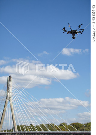 Copter flight against blue sky. RC aerial drone. Copter flight against blue sky. RC aerial drone. 24883445